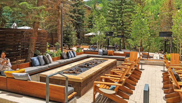 A cozy outdoor patio area at the Hythe, a Luxury Collection Resort in Vail's Lionshead Village.