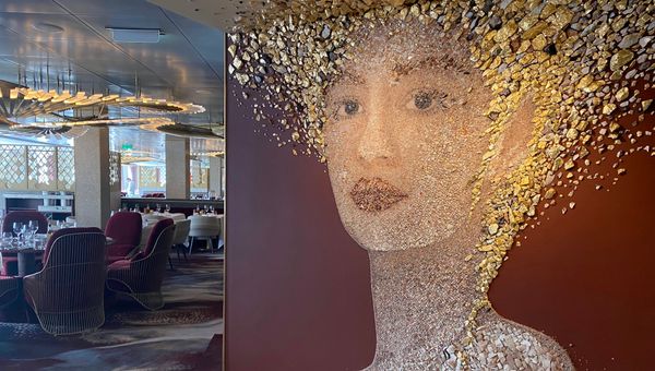 A portrait of a woman made of stones at the Cyprus Restaurant on Celebrity Ascent.