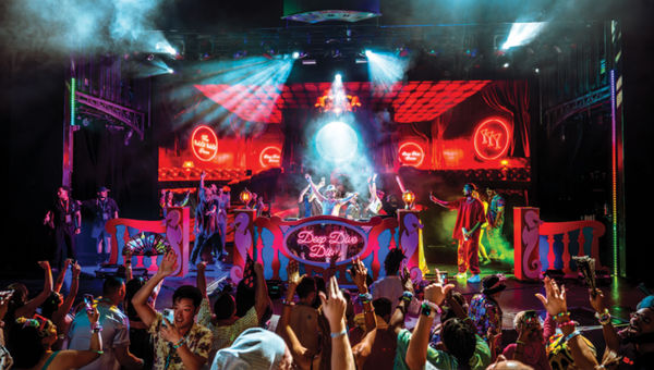 DJ Fisher pumps up the crowd at the Electric Daisy Carnival cruise on the Norwegian Joy.