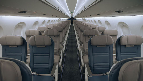 The interior of a Porter Airlines Embraer E195 E2 plane.